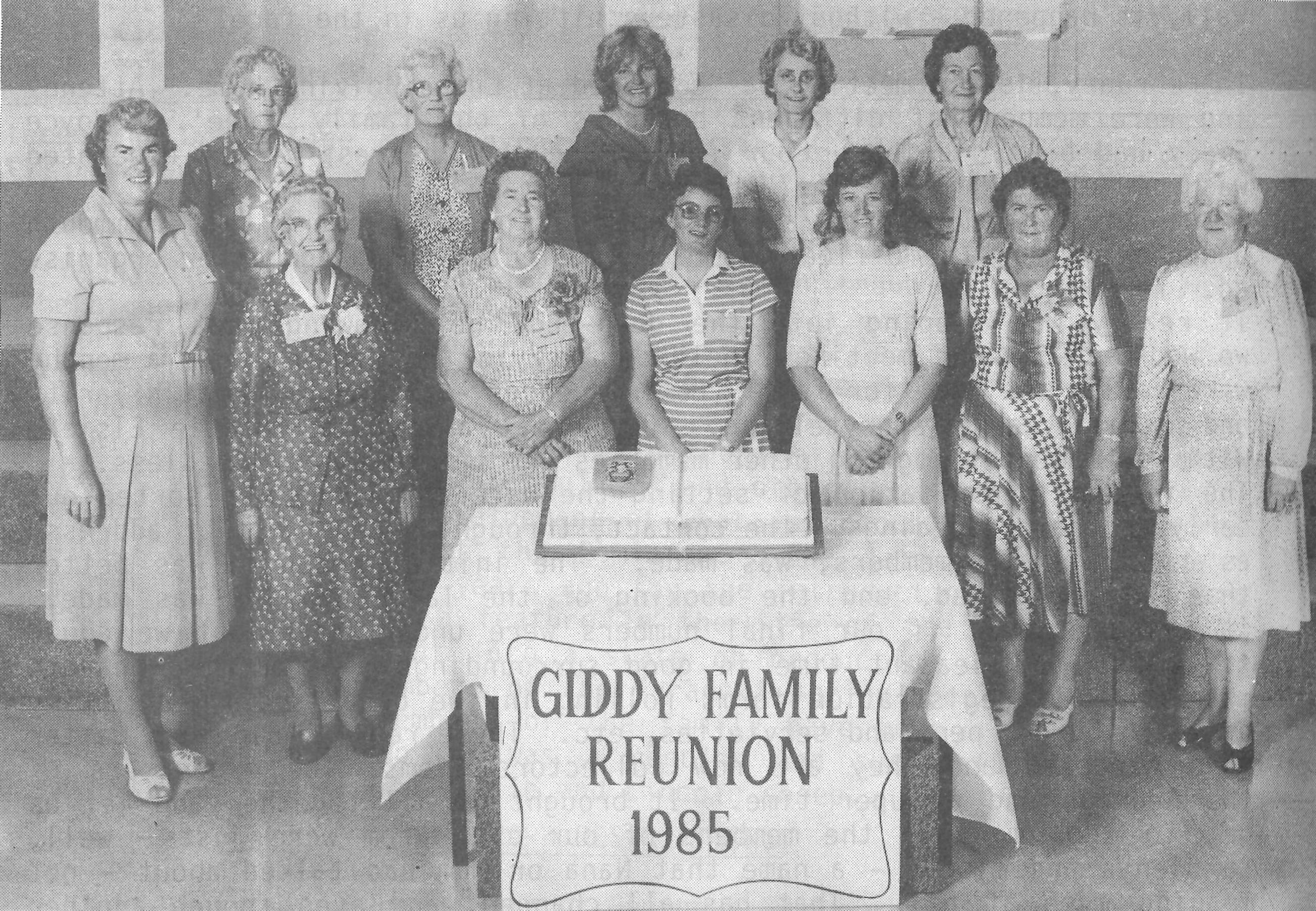 Elsie standing second from left in the front row at a family reunion. Image from "The yeoman pioneer: the story of George and Sally Giddy and their family" by Joyce Giddy (1986).