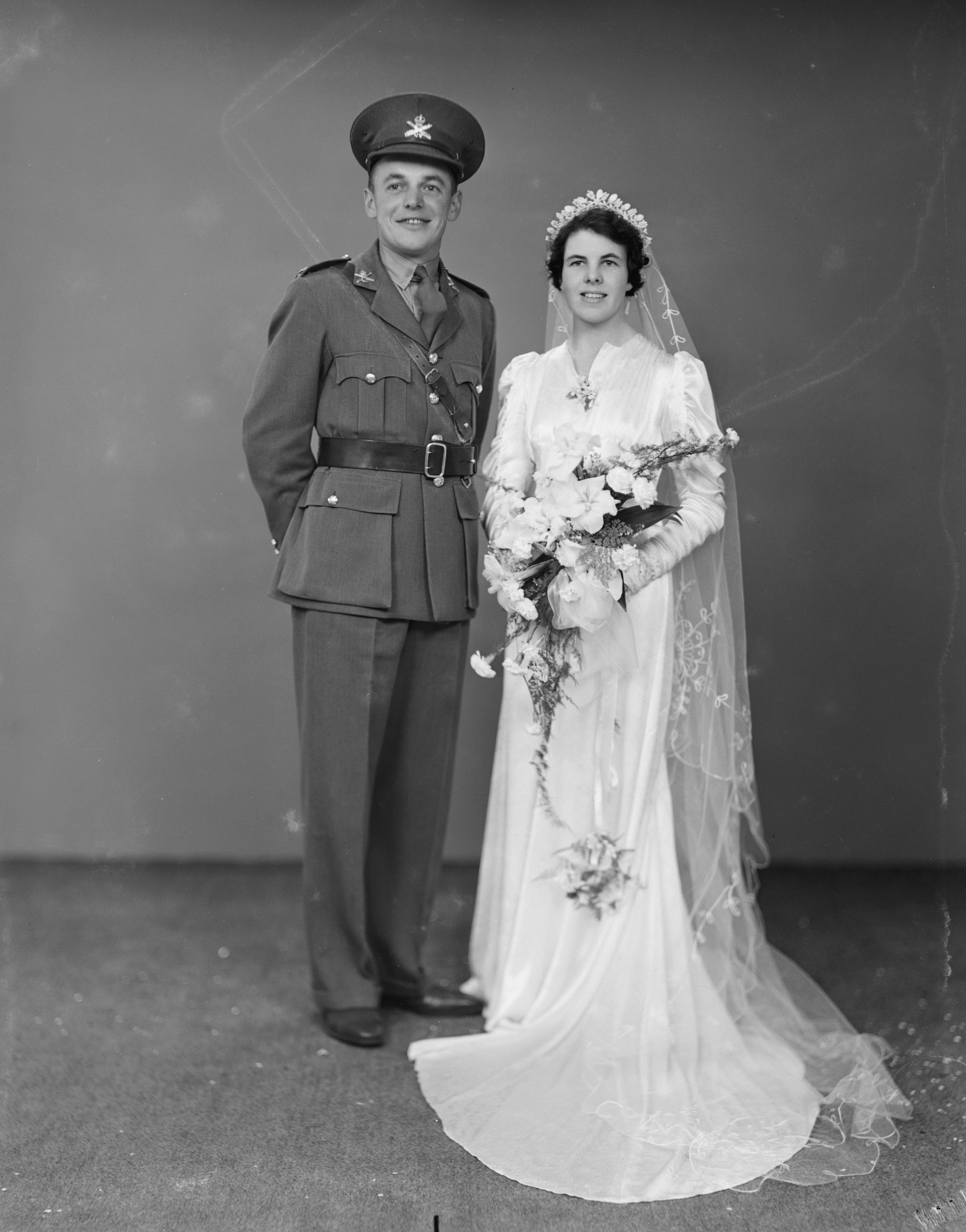 William Liley and Norma Treeby on their wedding day (18 December 1939). Swainson's Studios. Collection of Puke Ariki (WD.058707).