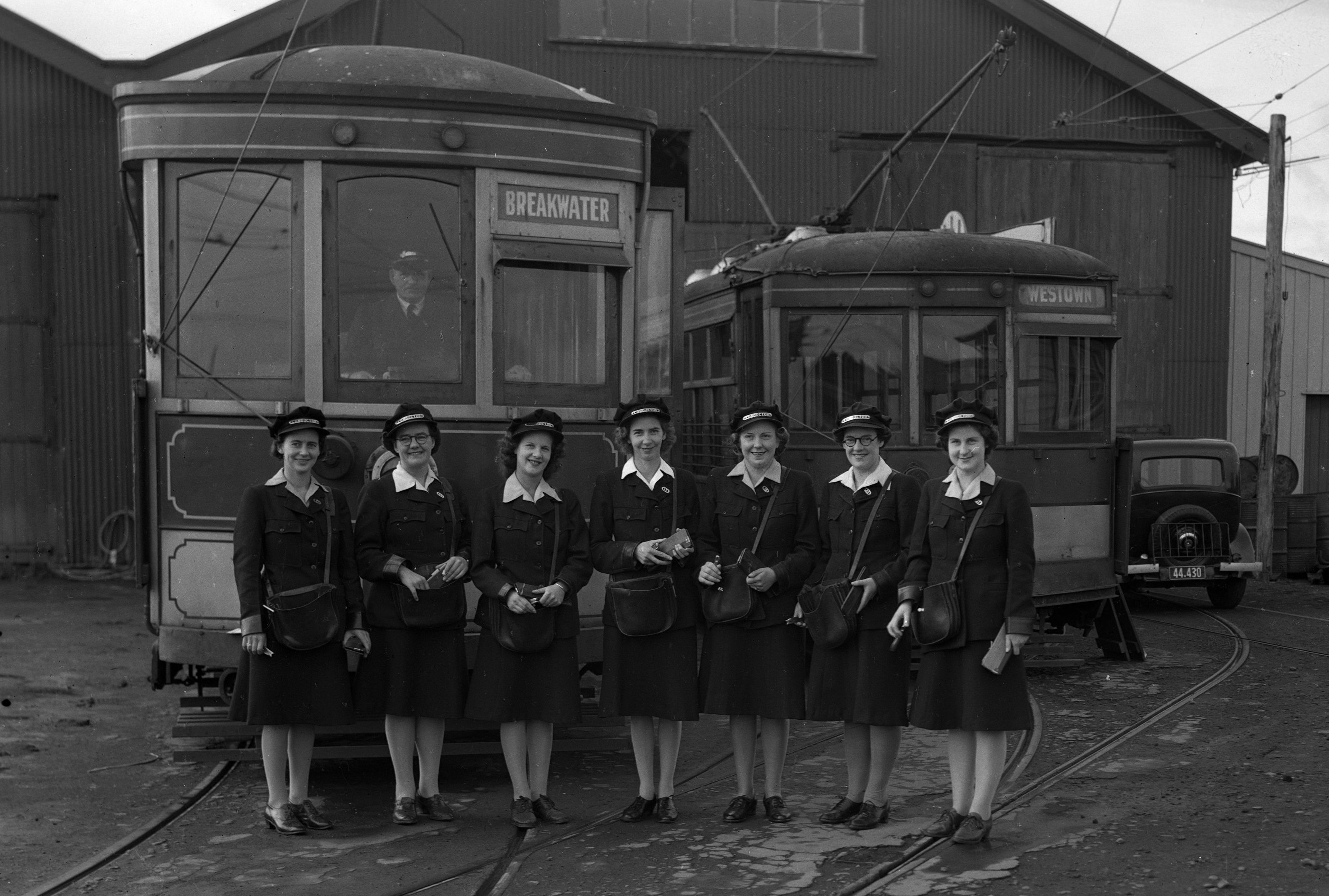 Female tram conductors outside the New Plymouth depot in Fitzroy - Betty Byers is standing on the far right (15 April 1945). Swainson's Studios. Collection of Puke Ariki (SW1945.1579).